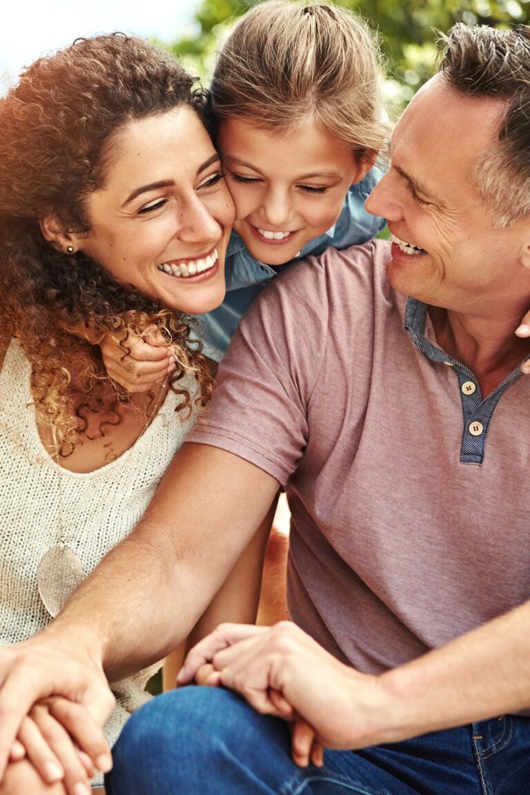 Family hug outdoor with bonding